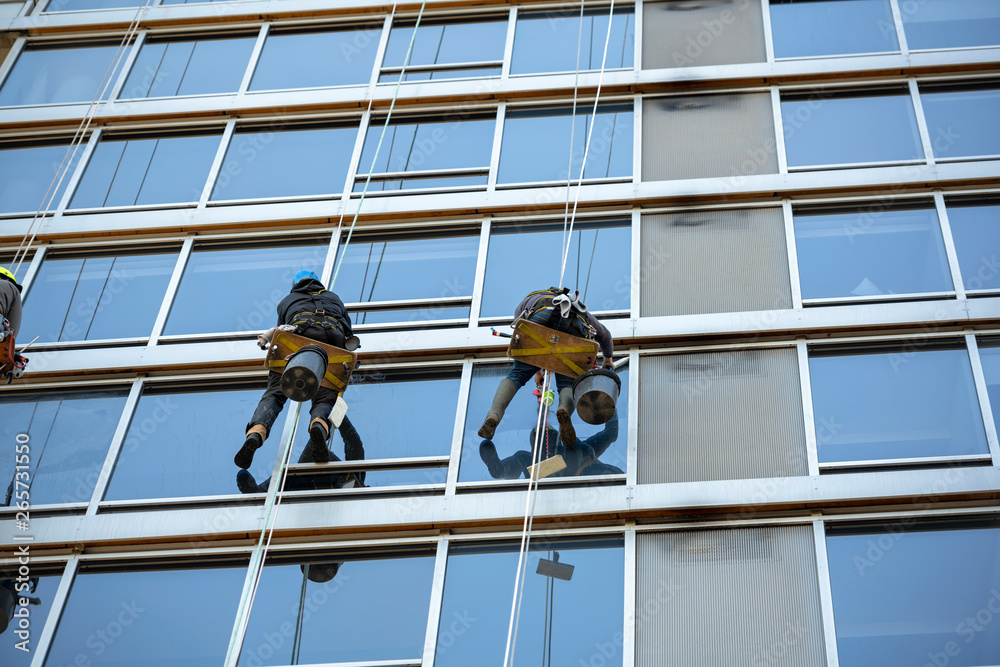Window washers at work on skyscraper
