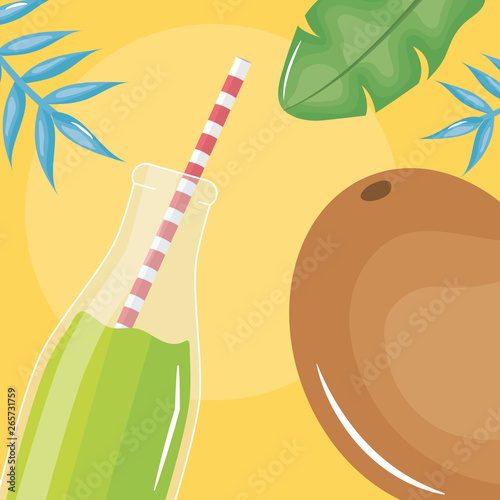 fresh juice kiwi fruit in botttle with straw in leafs palms