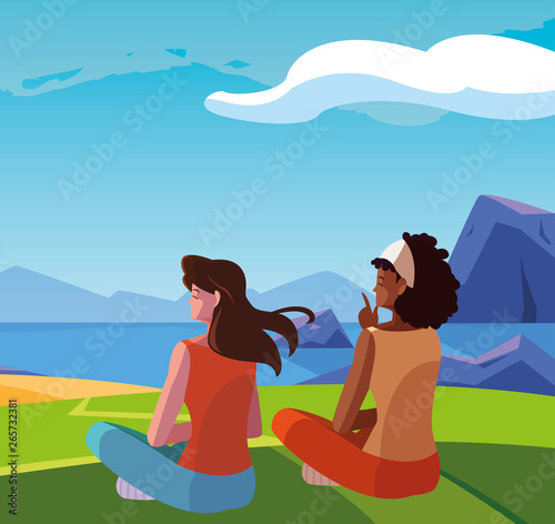 women couple contemplating the horizon in the field scene