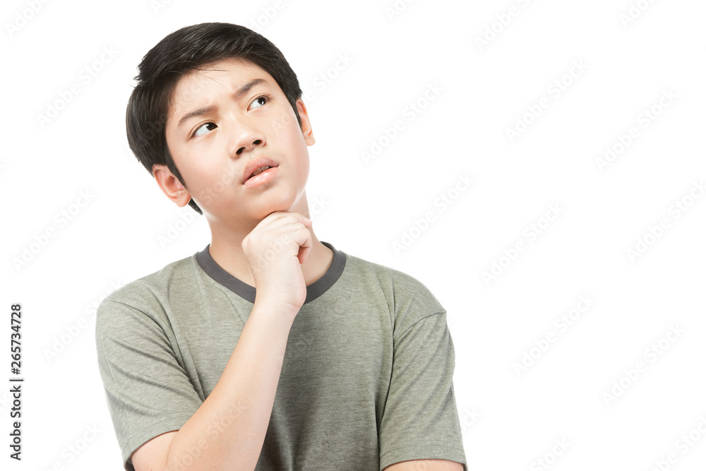 Half-length emotional portrait of asian young boy. Funny teenager Thinking and looking upwards , isolated on white background. Handsome unhappy child pointing up Half-length emotional portrait of asian young boy. Funny teenager Thinking and looking upwards , isolated on white background. Handsome unhappy child pointing up