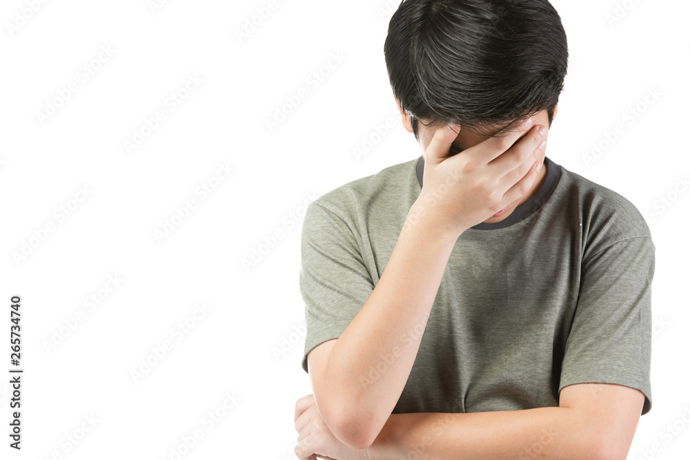 Portrait Young Asian boy over white background, be upset; have a bad temper emotional portrait of teen boy wearing t-shirt. Thoughtful teenager, isolated on white background. Portrait Young Asian boy over white background, be upset; have a bad temper emotional portrait of teen boy wearing t-shirt. Thoughtful teenager, isolated on white background.