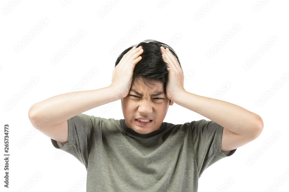 Portrait Young Asian boy over white background, be upset; have a bad temper emotional portrait of teen boy wearing t-shirt. Thoughtful teenager, isolated on white background. Portrait Young Asian boy over white background, be upset; have a bad temper emotional portrait of teen boy wearing t-shirt. Thoughtful teenager, isolated on white background.