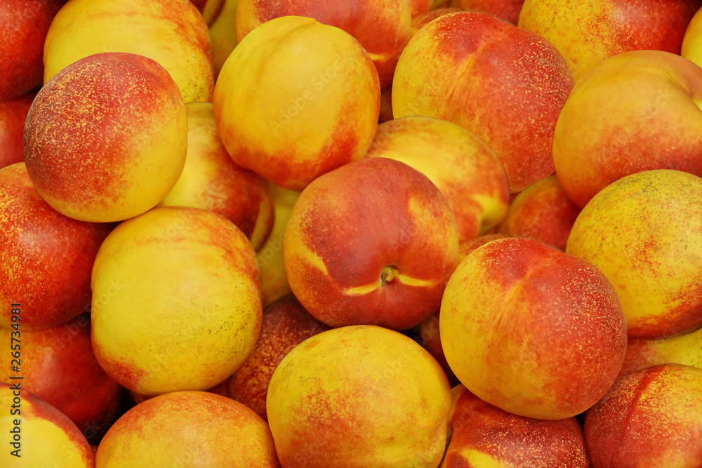 fruit background texture. nectarine peach yellow red ripe fruit. Fresh ripe food. fruit background texture. nectarine peach yellow red ripe fruit. Fresh ripe food.