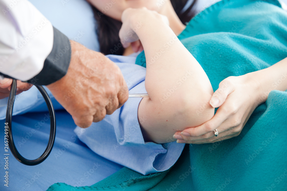 hand of a doctor or nurse with stethoscope. Temperature, fever, flu or ill diagnostic equipment. Hospital tool or instrument.