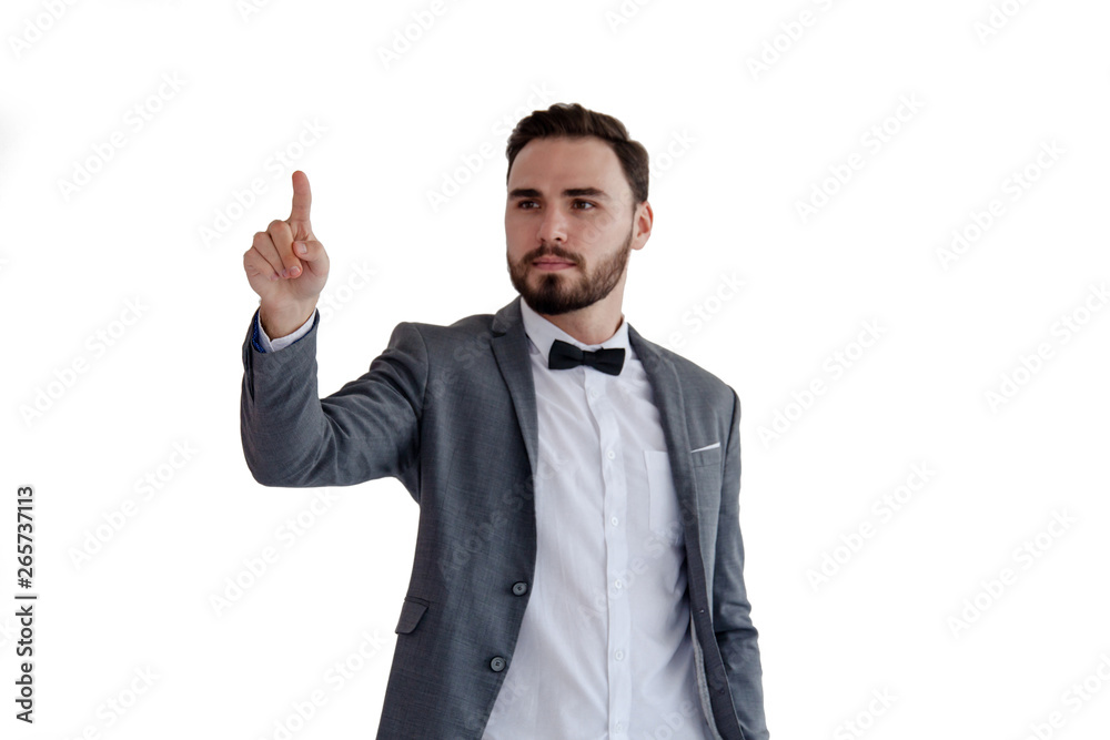 Man is standing and shows outstretched hand with open palm. Businessman hand touching virtual screen Man is standing and shows outstretched hand with open palm. Businessman hand touching virtual screen
