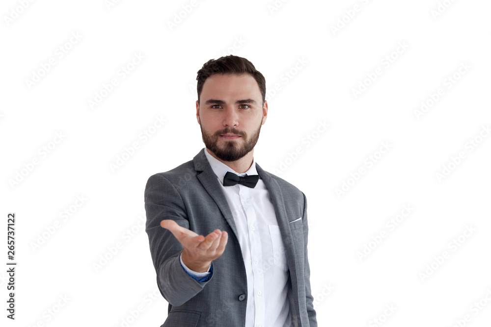 Man is standing and shows outstretched hand with open palm. Businessman hand touching virtual screen