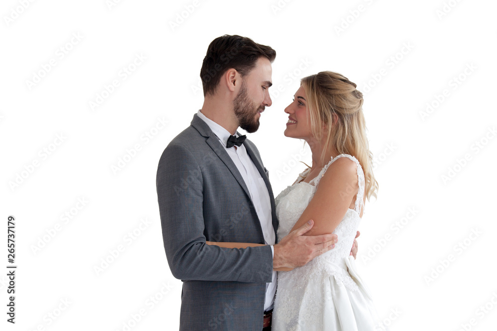 Wedding couple in love. Beautiful bride in white dress  and man handsome ,white  background