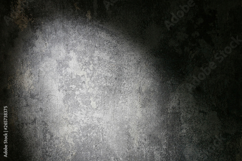 Foto Dramatic lighting on grey stone background