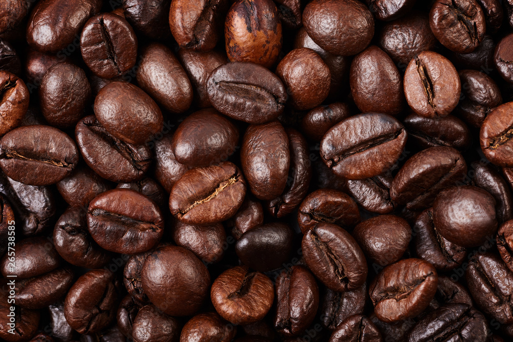 Strong roasted coffee beans texture background. Strong roasted coffee beans texture background.
