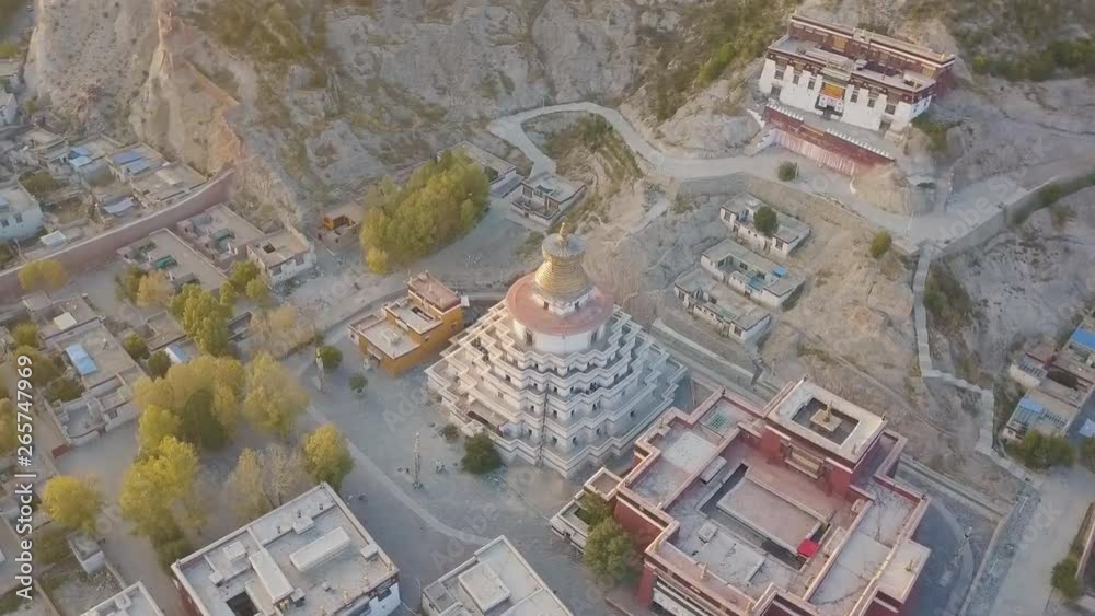 Panchen Lama residency called Little Potala in Shigatse city, Tibet, China. Cityscape from old buddhist monastery. (aerial photography) Panchen Lama residency called Little Potala in Shigatse city, Tibet, China. Cityscape from old buddhist monastery. (aerial photography)
