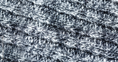黒と白の霜降りニットのリブ編みの背景