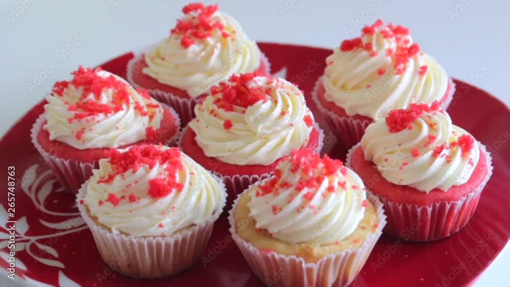 Red velvet cupcake. The finished cakes are on the plate. Red velvet cupcake. The finished cakes are on the plate.