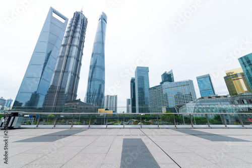 Photography The pedestrian pavement under the tall building large building.