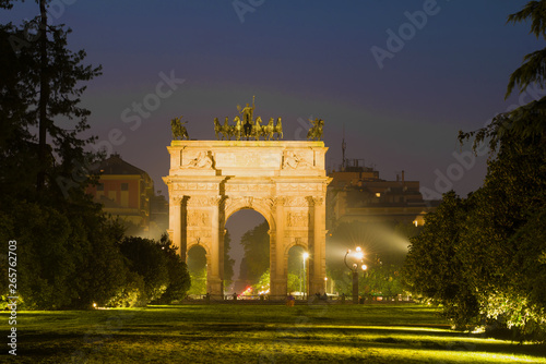 View of the old Triumphal Arch (Porta Sempione) in September night, Milan