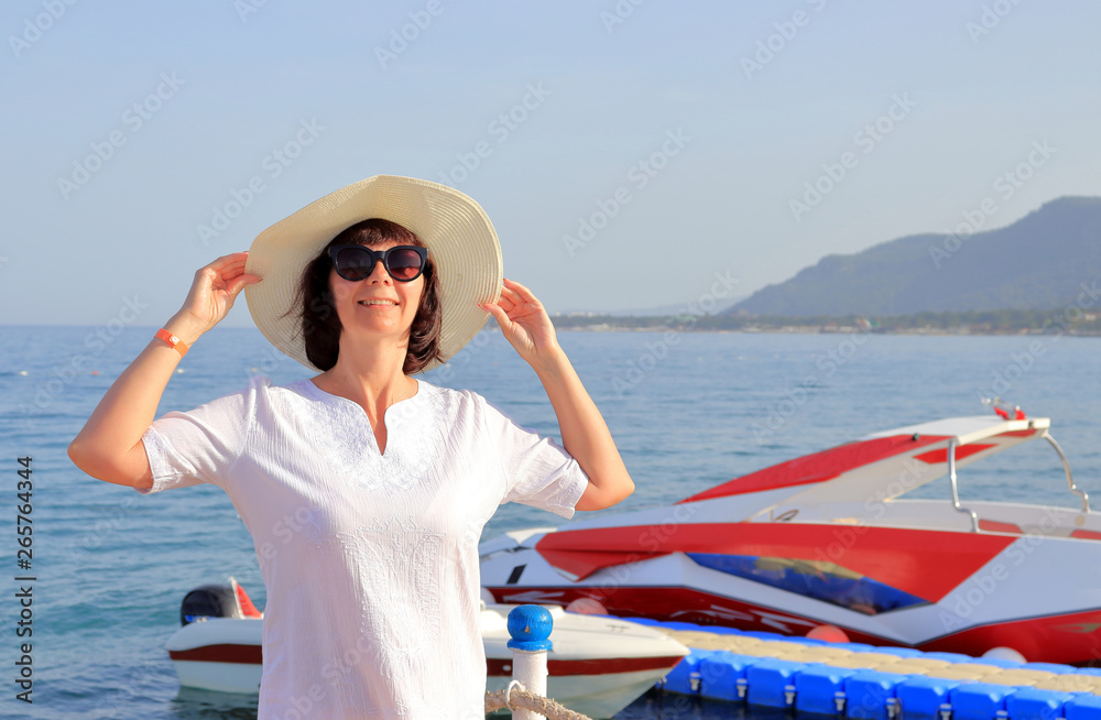 Woman on the sea beach