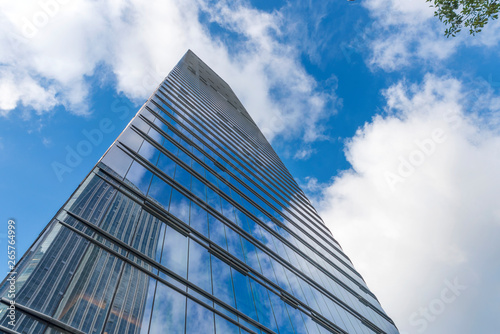 Window glass, Modern architecture in the blue sky white cloud city