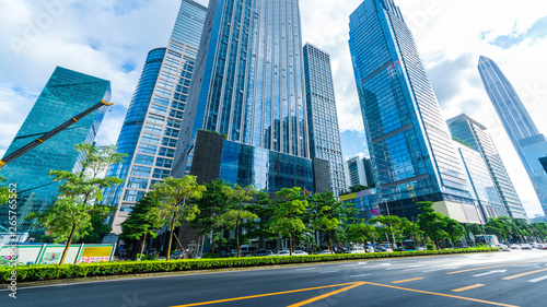 highway transportation and the high-rise building under the blue sky.