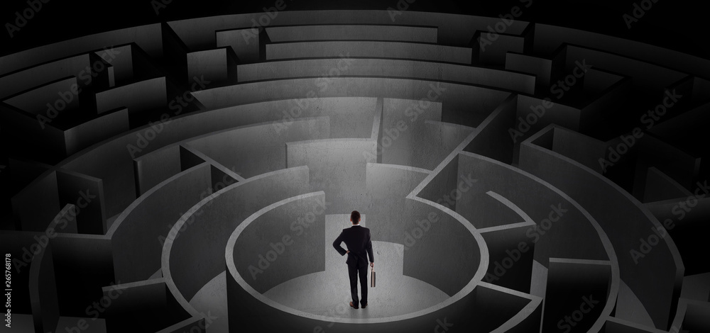 Businessman can not decide which entrance to chose in a middle of a dark maze
Businessman can not decide which entrance to chose in a middle of a dark maze