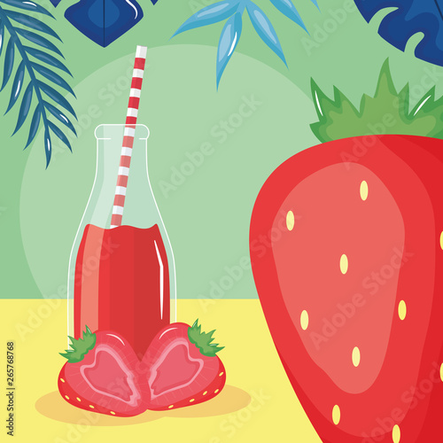 fresh strawberries juice fruit in botttle with straw in leafs palms