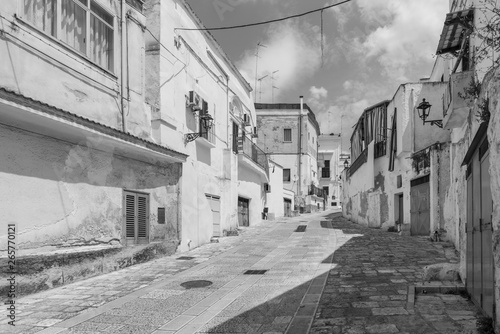 Massafra and its ravines. Houses built in the rock. Puglia in Black and White. Italy