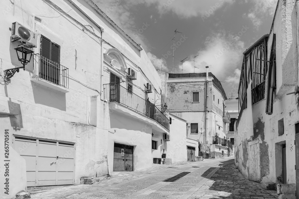 Massafra and its ravines. Houses built in the rock. Puglia in Black and White. Italy Massafra and its ravines. Houses built in the rock. Puglia in Black and White. Italy