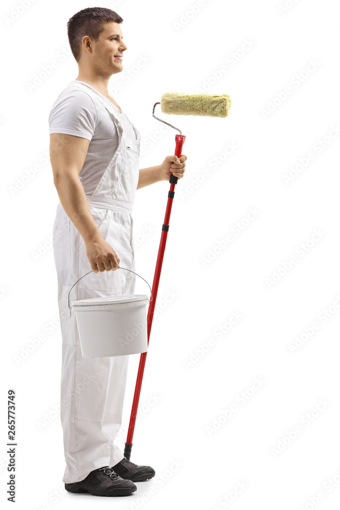 Wall painter guy holding a backet Wall painter guy holding a backet