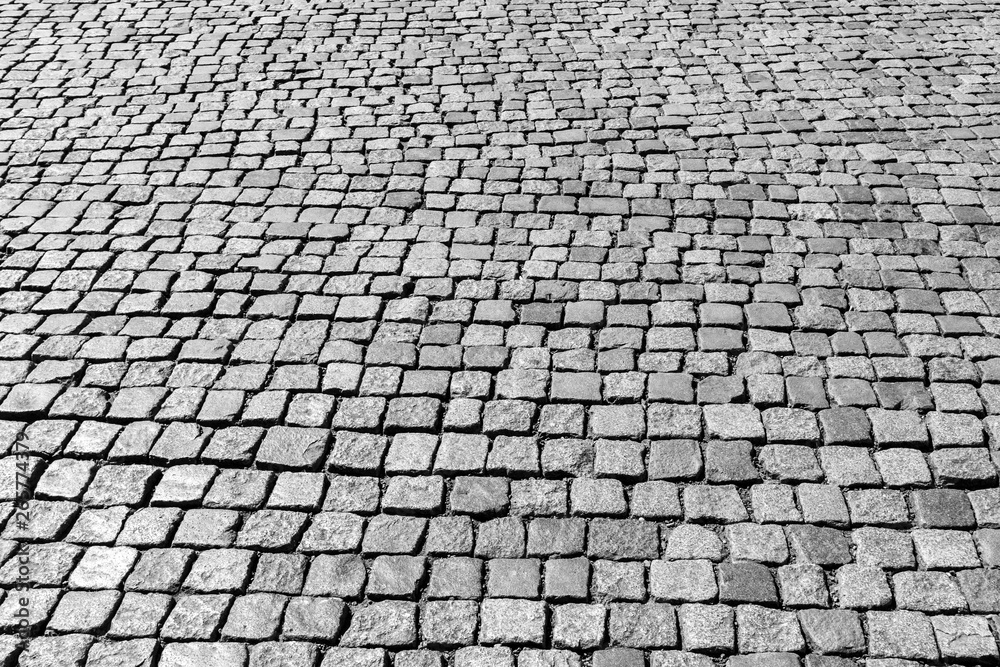 Old pavement of granite texture. - obrazy, fototapety, plakaty 