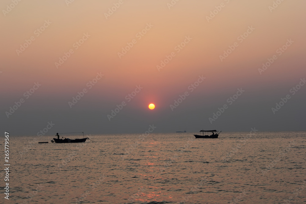 Sunrise and sunset on the sea and boat.