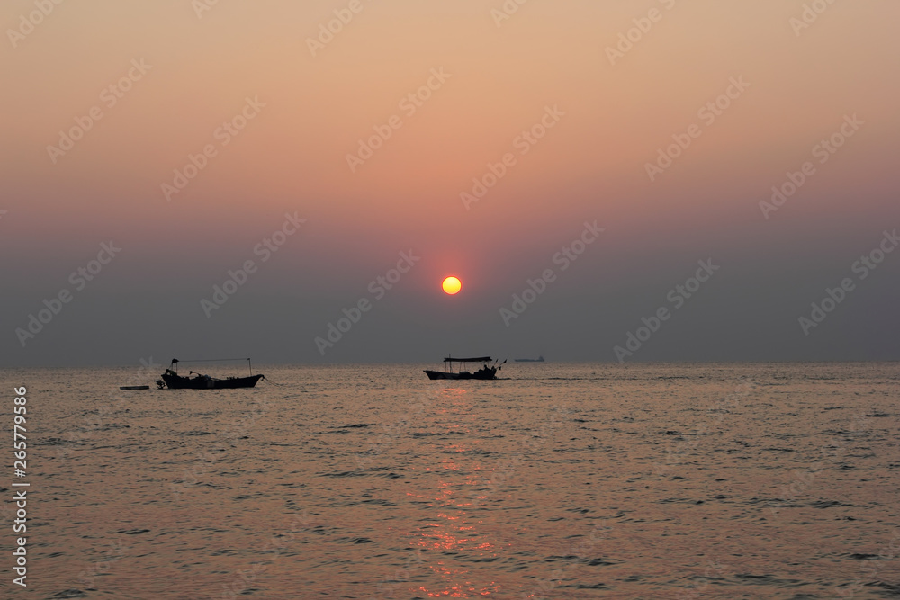 Sunrise and sunset on the sea and boat.