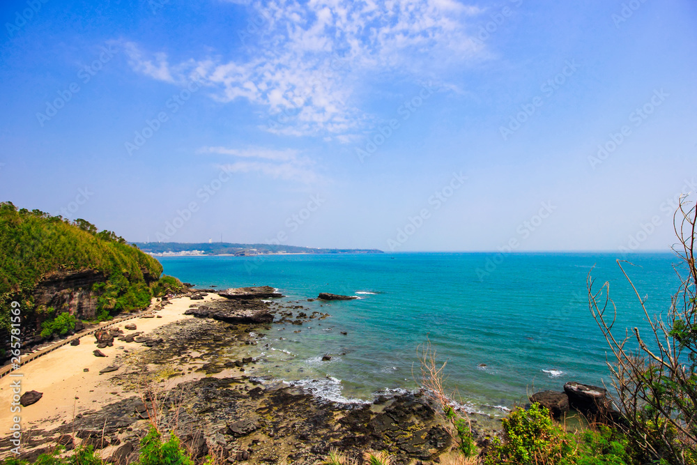 A volcanic rock by the sea. A volcanic rock by the sea.