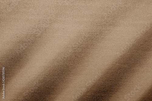 Plastic glittering texture in brown tone.