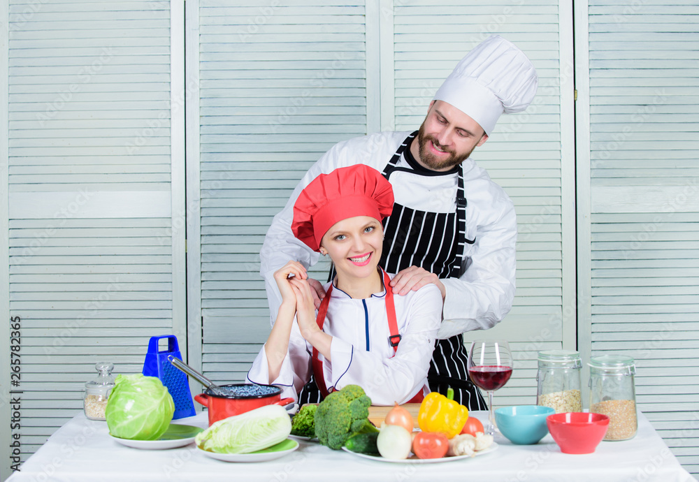 Woman and bearded man culinary partners. Ultimate cooking challenge. Couple compete in culinary arts. Reasons why couples cooking together. Cooking with your spouse can strengthen relationships Woman and bearded man culinary partners. Ultimate cooking challenge. Couple compete in culinary arts. Reasons why couples cooking together. Cooking with your spouse can strengthen relationships