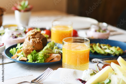 Delicious food served on various plates on a table