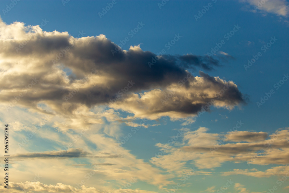 Clouds in the sky at sunset as a background