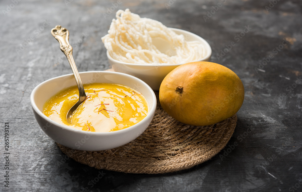Mango Ras Background Aam Ras or Alphonso mango pulp with kurdai which is a fried dish made ...