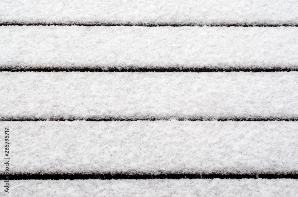 Fototapeta premium Fresh white snow attacked the boards