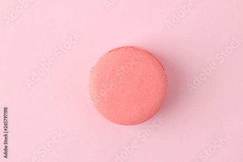Macarons. french multicolored macaroons cakes. small french sweet cake on bright pink background. Dessert. Sweets. top view. minimalism