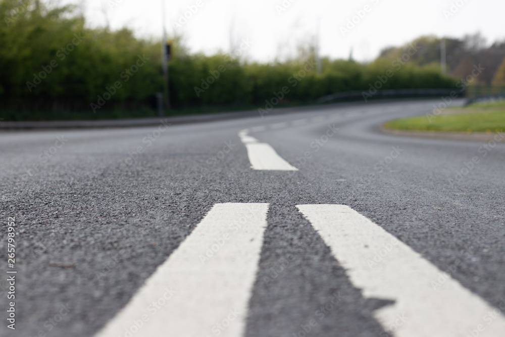 white lanes on asphalt