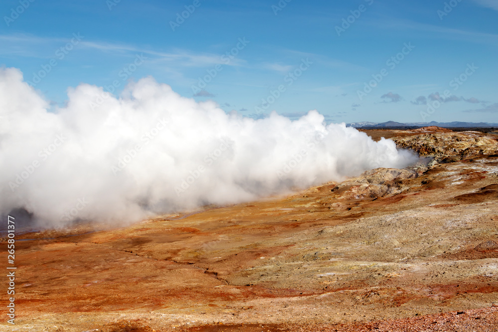 Geothermal alternative energy concept. Gunnuhver geothermal area in Iceland. Geyser steam.