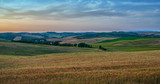Tuscan hills during harvest period. Unique landscape with rolling hills. Travel. Beautiful destination. Vacation trip.