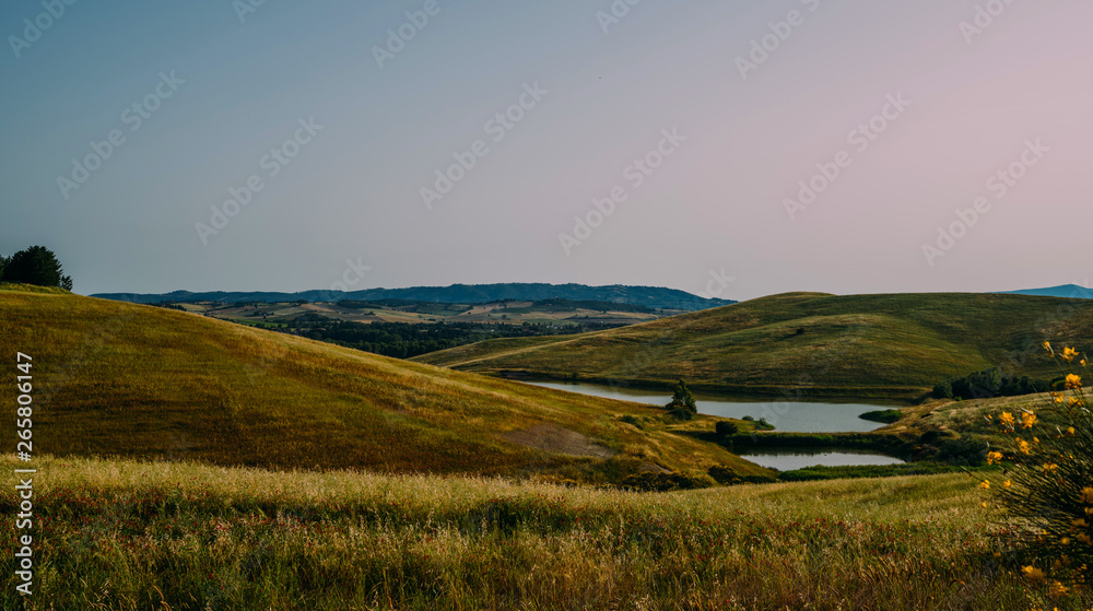 Fototapeta premium Beautiful landscape, tourist visit in in Tuscany, Italy. Summer, holiday, traveling concept.