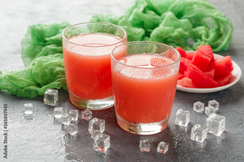 Two bottles of watermelon juice Two bottles of watermelon juice