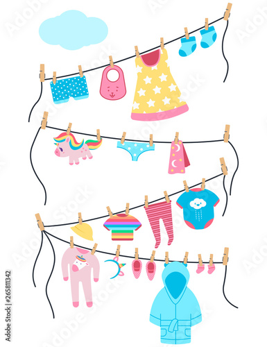 Baby clothes and toys on a clothesline with clothespins. Vector cartoon illustration isolated on a white background.