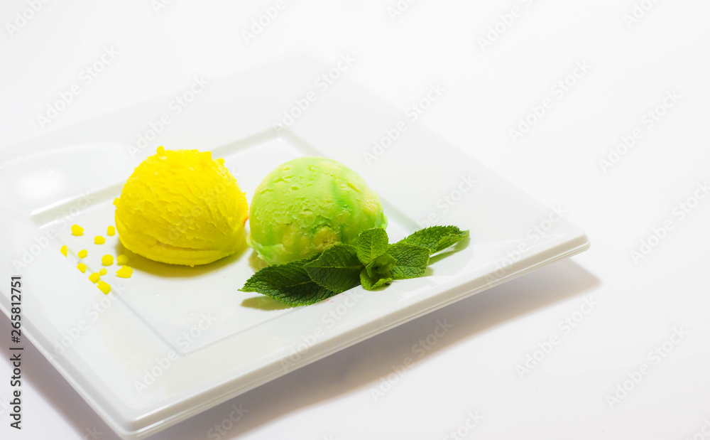 Set of ice cream scoops of different colors and flavours with fruits decoration isolated on white background Set of ice cream scoops of different colors and flavours with fruits decoration isolated on white background