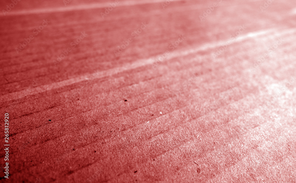 Cardboard close-up with blur effect in red tone. Cardboard close-up with blur effect in red tone.