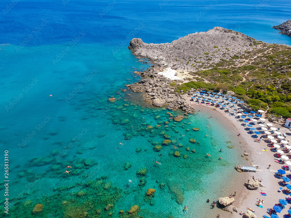 Aerial birds eye view drone photo Ladiko bay near Anthony Quinn on Rhodes island, Dodecanese, Greece. Panorama with nice lagoon and clear blue water. Famous tourist destination in South Europe Aerial birds eye view drone photo Ladiko bay near Anthony Quinn on Rhodes island, Dodecanese, Greece. Panorama with nice lagoon and clear blue water. Famous tourist destination in South Europe