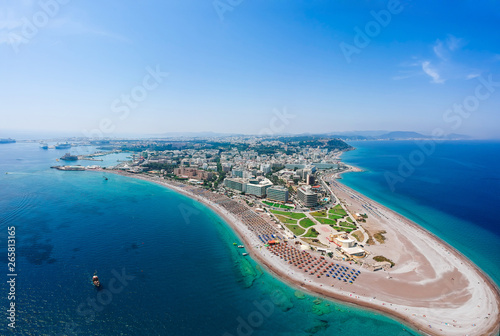 Aerial birds eye view drone photo of Elli beach on Rhodes city island, Dodecanese, Greece. Panorama with nice sand, lagoon and clear blue water. Famous tourist destination in South Europe photo