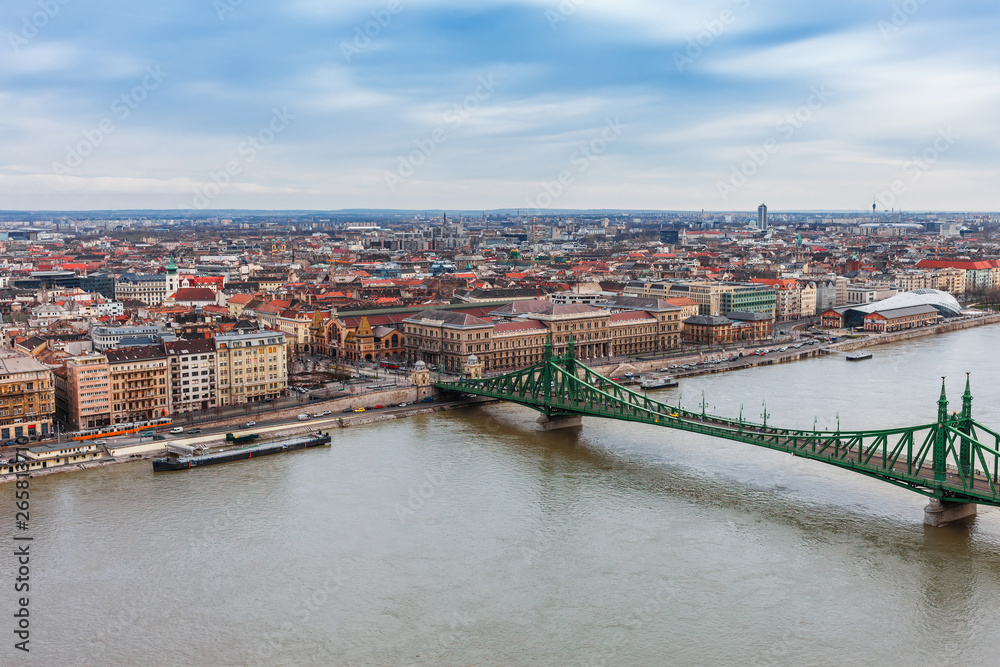 Fototapeta premium Panorama cityscape of famous tourist destination Budapest with Danube and bridges. Travel landscape in Hungary, Europe.