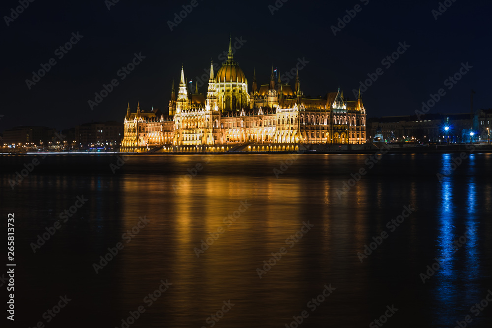 Night view of Budapest. Panorama cityscape of famous tourist destination with Danube, parliament and bridges. Travel illuminated landscape in Hungary, Europe.