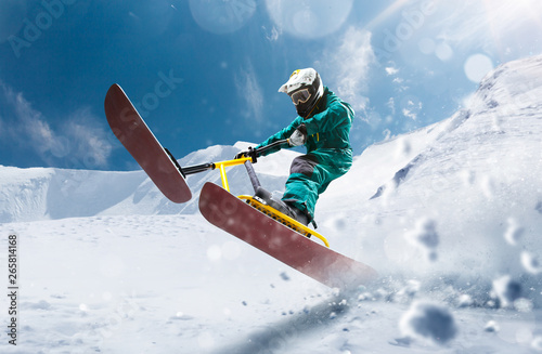 Snow scoot. Snow bike. Extreme winter sports.